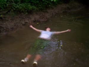 Maggie floating in the creek