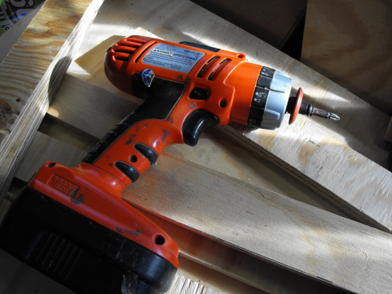 Drill and cut pieces for a bee hive lid