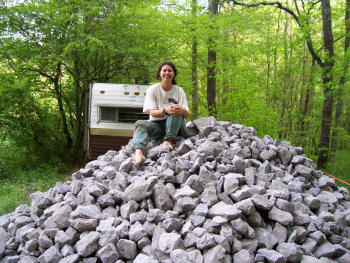 Sitting on a pile or riprap.