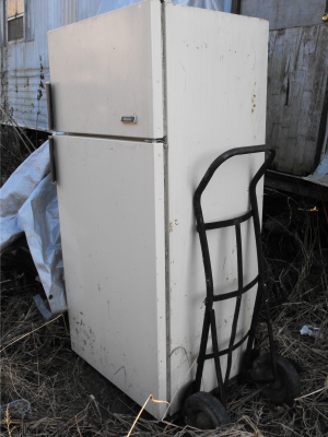 Old fridge to be turned into a root cellar.