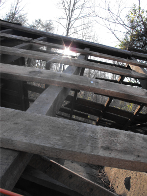 Old building torn down to the roof rafters