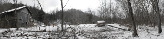 The barn and chicken tractor in the snow