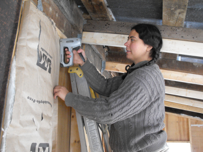 Putting up wall insulation