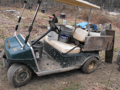 Hauling manure in the golf cart