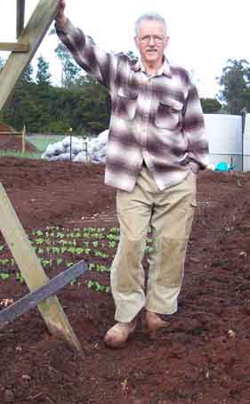 Steve Solomon in front of his garden