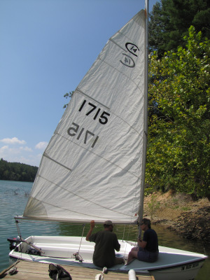 Putting up the sail in a small sailboat