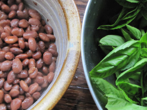 Bowl of beans and bowl of basil