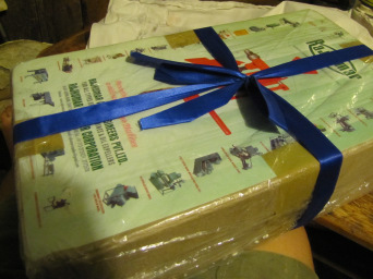 Expeller box wrapped in a bow