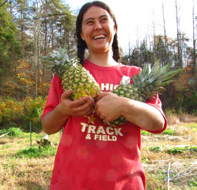 Anna with 2 pineapples