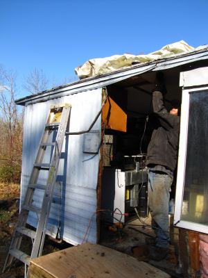 Tearing out the trailer wall