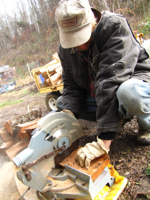 Cutting firewood with a miter saw