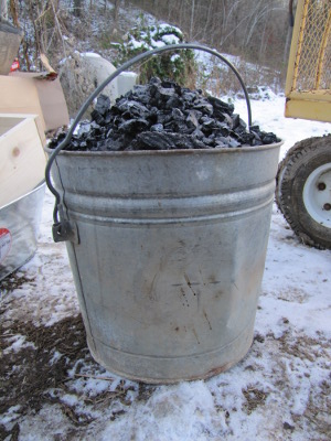 Bucket of charcoal and ashes