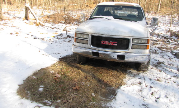 truck stuck with snow in background