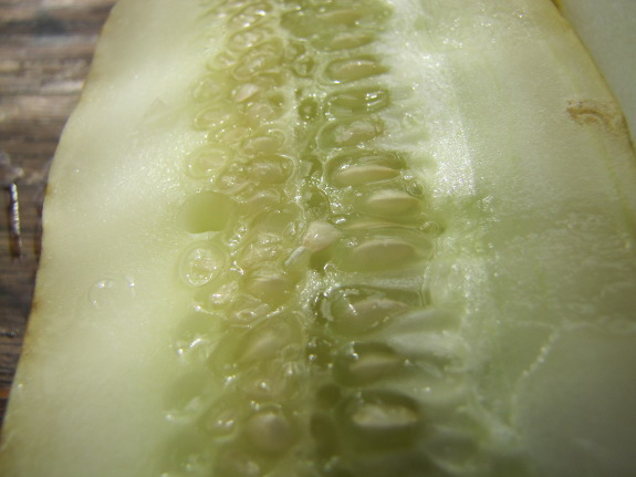 Slice cucumber in half