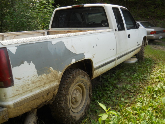 white GMC truck slightly aged