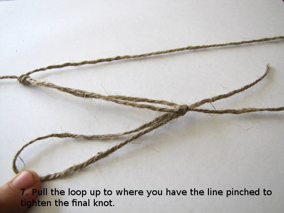 Pull the loop up to where you have the line pinched to tighten the final knot.