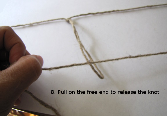 Pull on the free end to release the knot