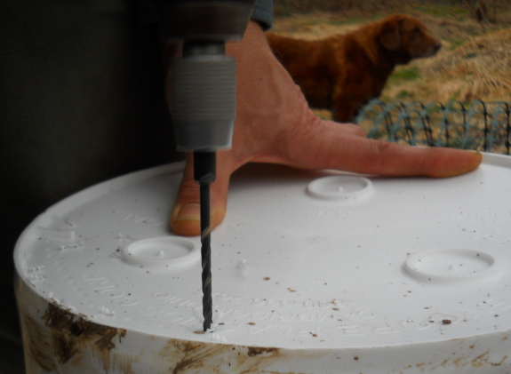 Drilling holes to make a diy 5 gallon bucket honey strainer