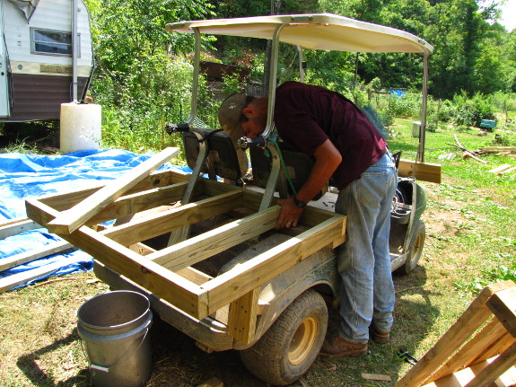 Golf cart bed supports