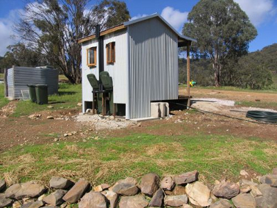 Wheelie bin composting toilet