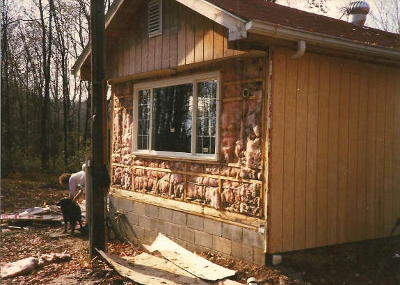 Insulation behind siding