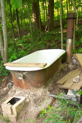 Rocket stove bathtub