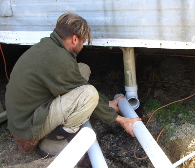 PVC 3 inch pipe connecting at a slight angle