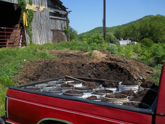 5 gallon buckets of manure in S-10 truck