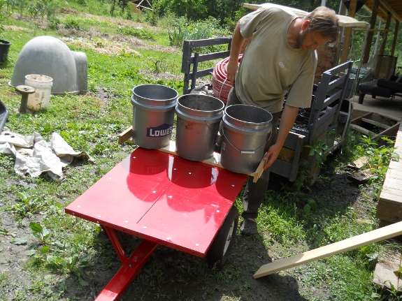 Modified Haul Master lawn trailer to fit 12 five gallon buckets