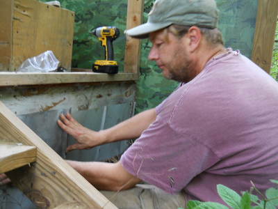 Closing off the
composting toilet walls