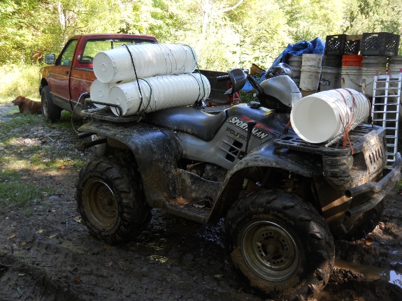 using ATV to haul massive amount of 2 gallon buckets