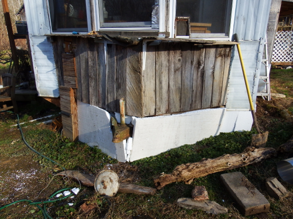 Insulating around the base of a trailer