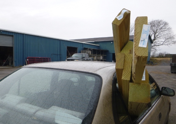 lumber in back of car