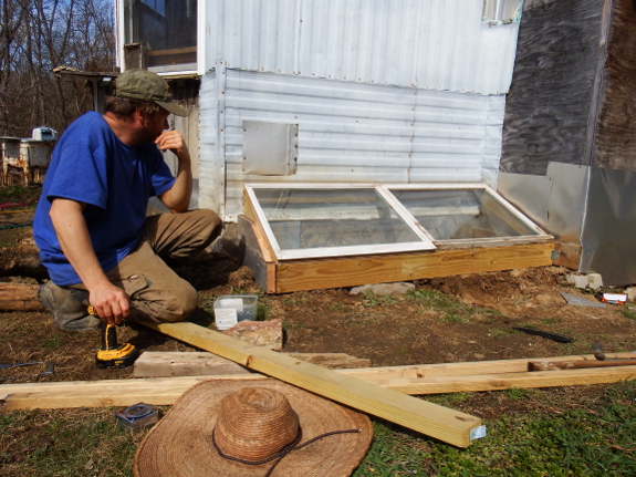 Cold frame attached to a house
