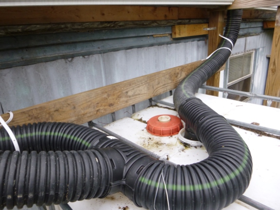 IBC rain barrel water junction