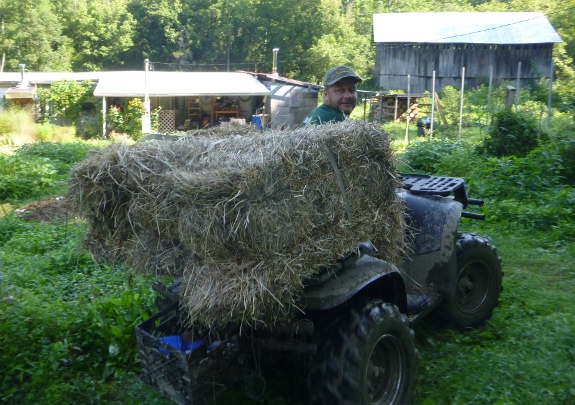 ATV with hay bales three