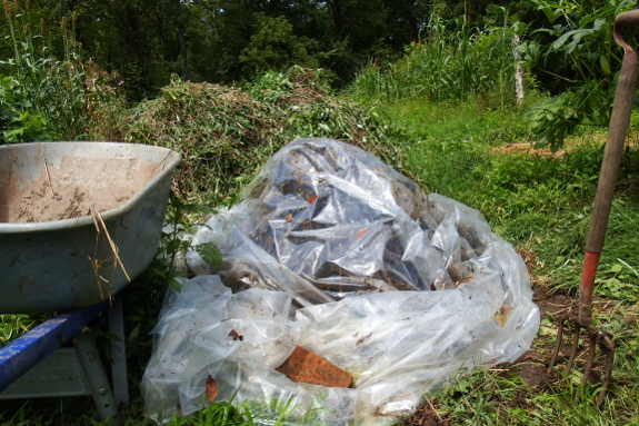 Covered compost pile