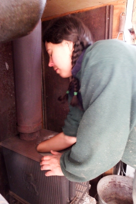 Cleaning out a wood stove baffle