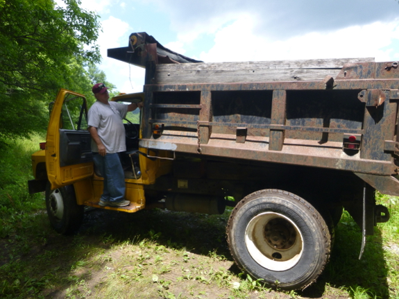 Freddy with his dump truck of horse manure