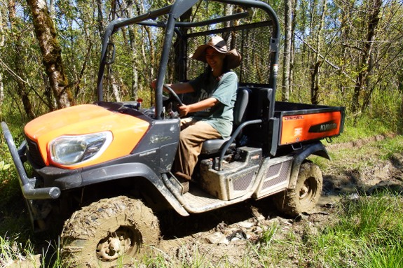 Anna learning to drive the Kubota X900.