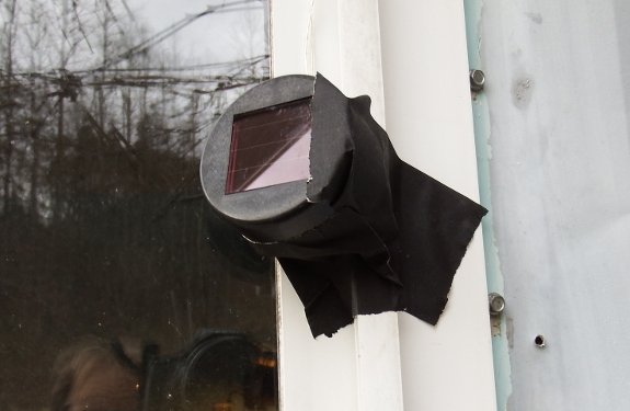 Solar cell mounting with gaffer tape.