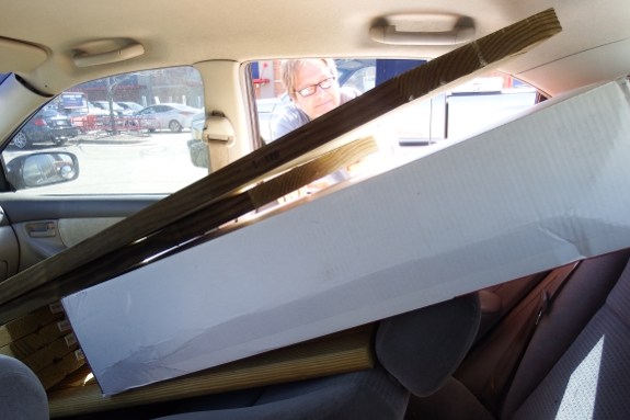 Hauling lumber in a car